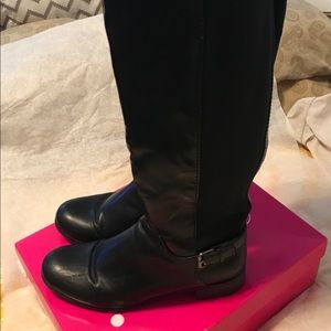 Black Faux leather boots.